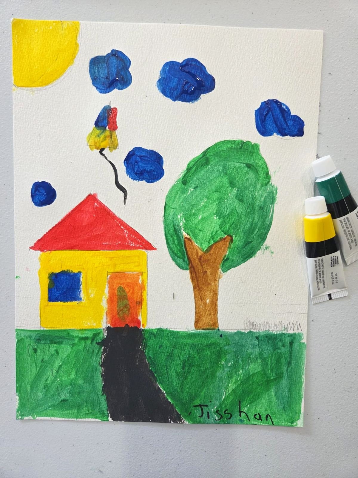 Student painting of a house and tree by a Young Watercolorists class student