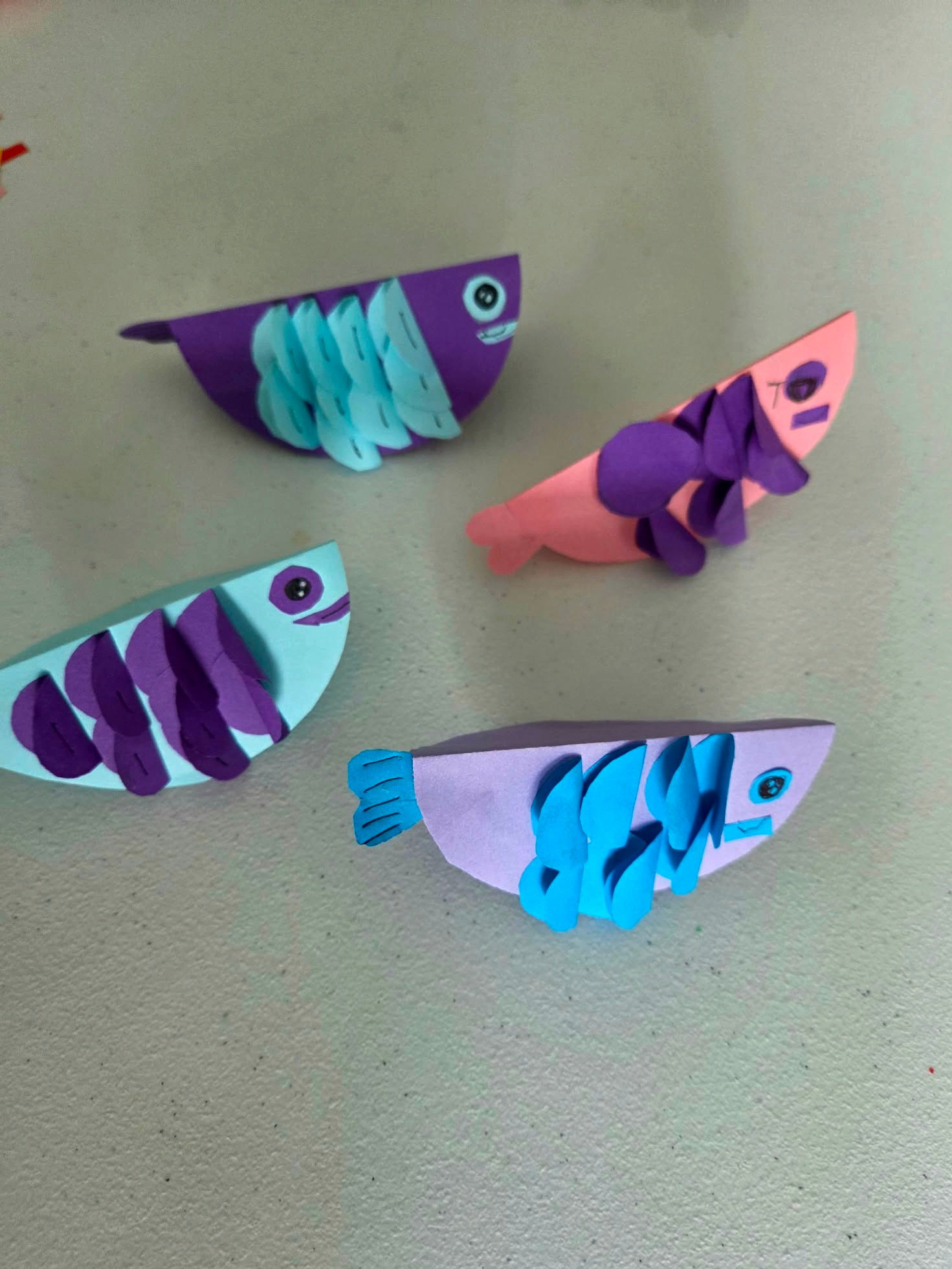 Student Paper Hand Craft project — paper fish creations made by kids